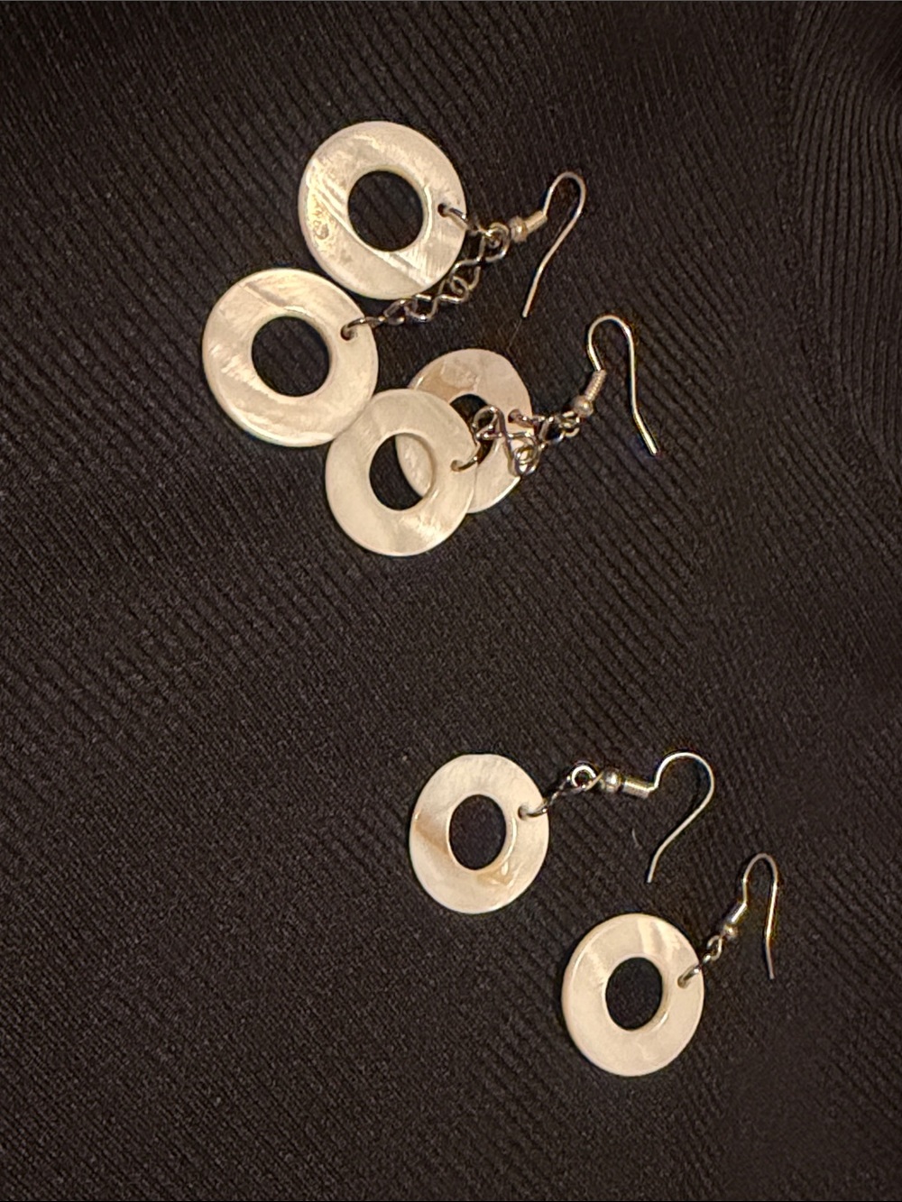 Set of two handmade mother-of-pearl-like circle earrings